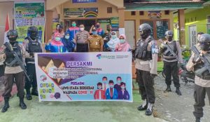 Persakmi Lutra dan Polri-TNI Perangi Covid-19, Bagi Masker ke Pengendara