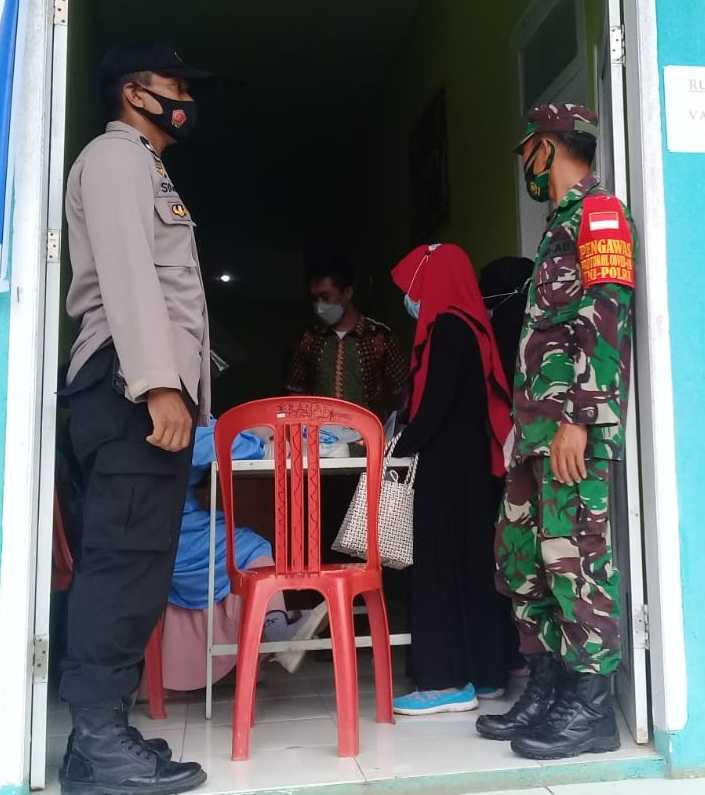 Hari ke-III, Personel Polsek Marbo Pantau Vaksinasi di Puskesmas Marbo