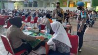 Tim Vaksinator Door to Door Polres Pelabuhan Vaksin Dosis Kedua Pelajar SMPN 5 Makassar