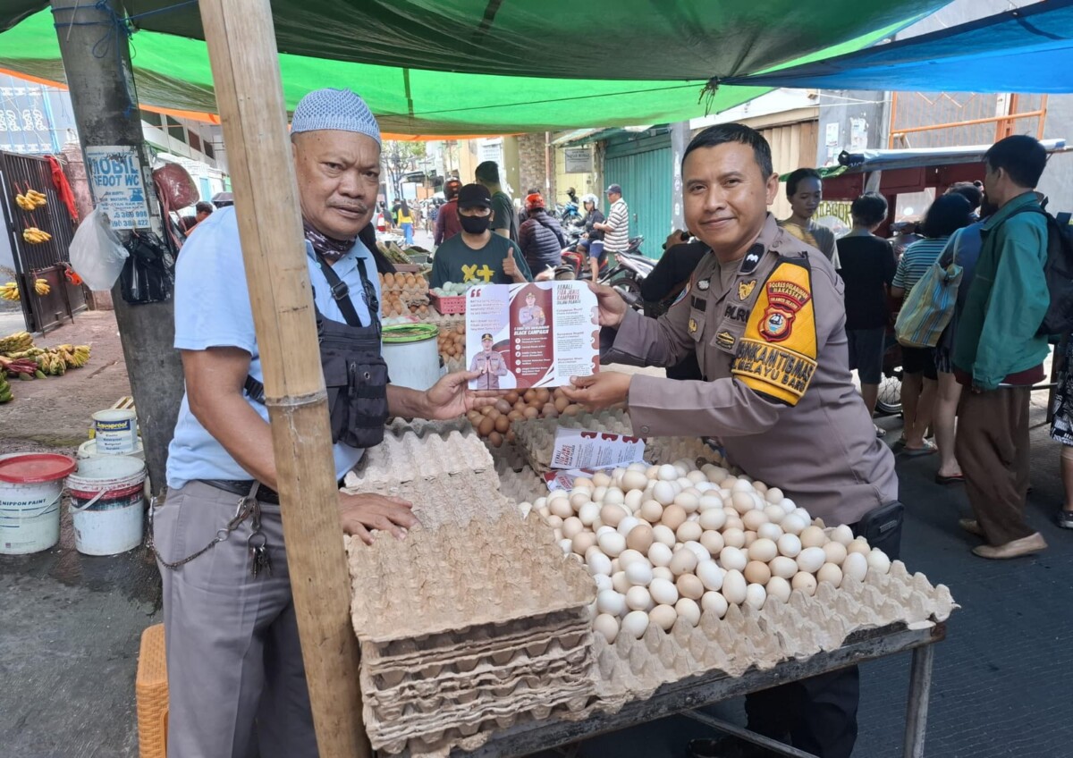 Polres Pelabuhan Bagikan Brosur Pemilukada